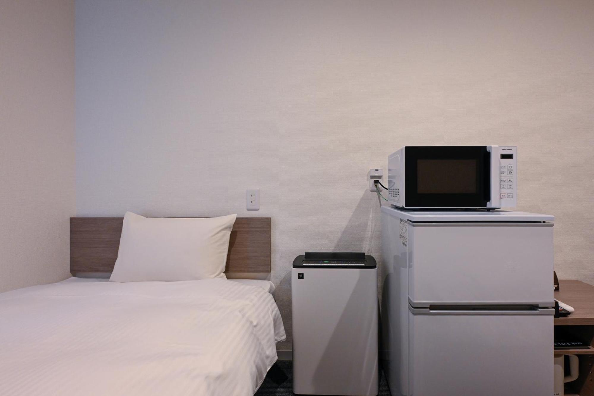 Hotel R9 The Yard Kanra Экстерьер фото