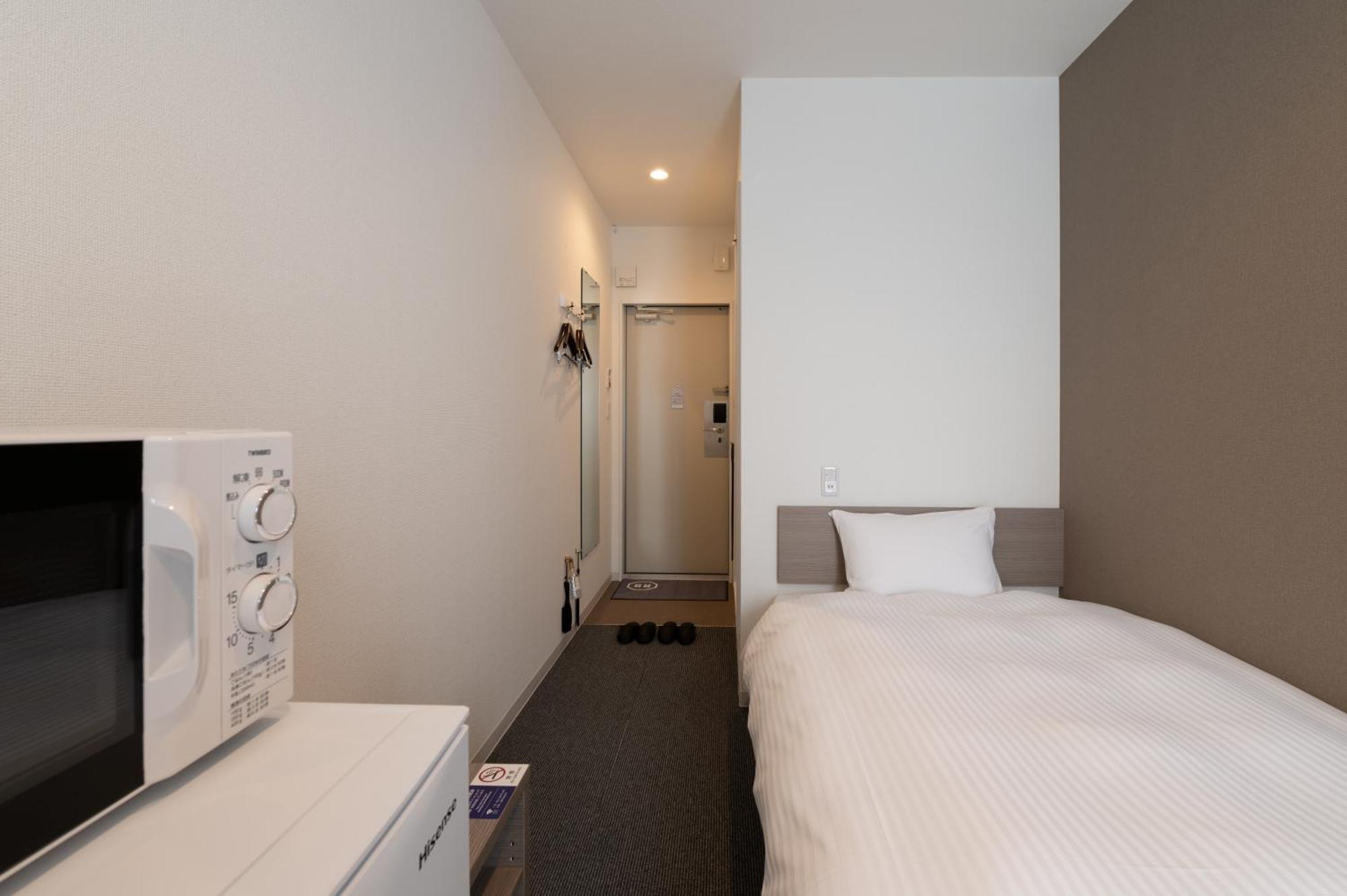 Hotel R9 The Yard Kanra Экстерьер фото